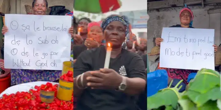 Ghana traders light candles, display placards in honor of Mohbad (Video) 